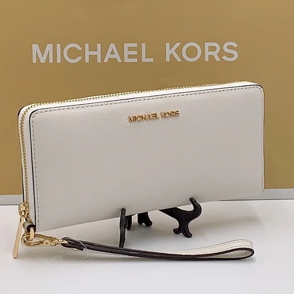 MICHAEL KORS LARGE TRAVEL CONTINENTAL WRISTLET WALLET PHONE OPTIC WHITE COLOR